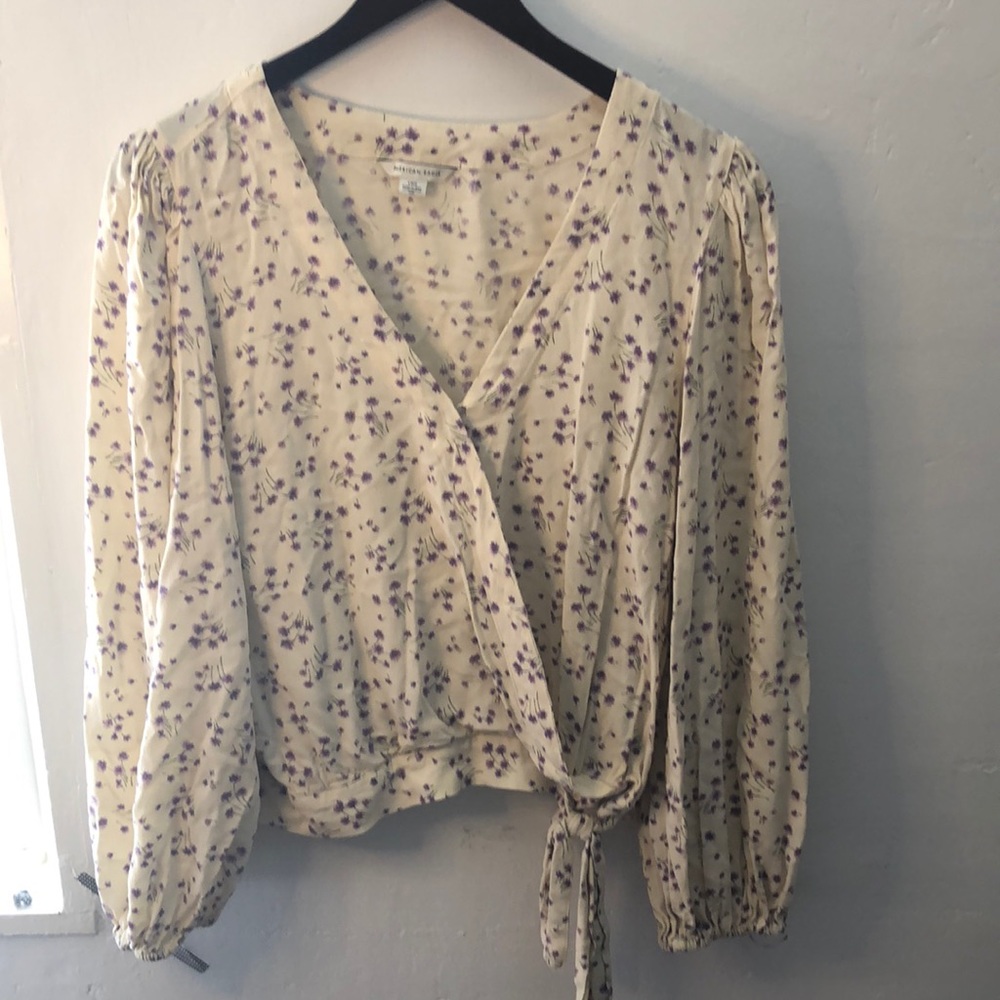 Yellow blouse with purple flowers